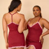 GIP_727 (minidress 3) Two models wearing the Rêverie Collection minidress. One stranding with the back and another standing with the front, facing the camera